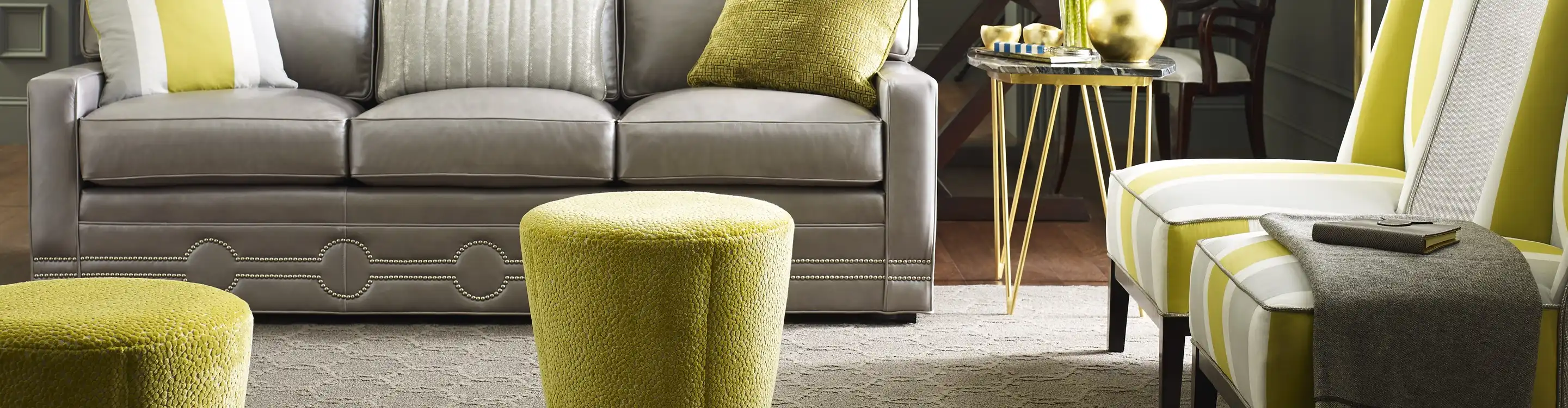 cream area rug in living area with lime green accents